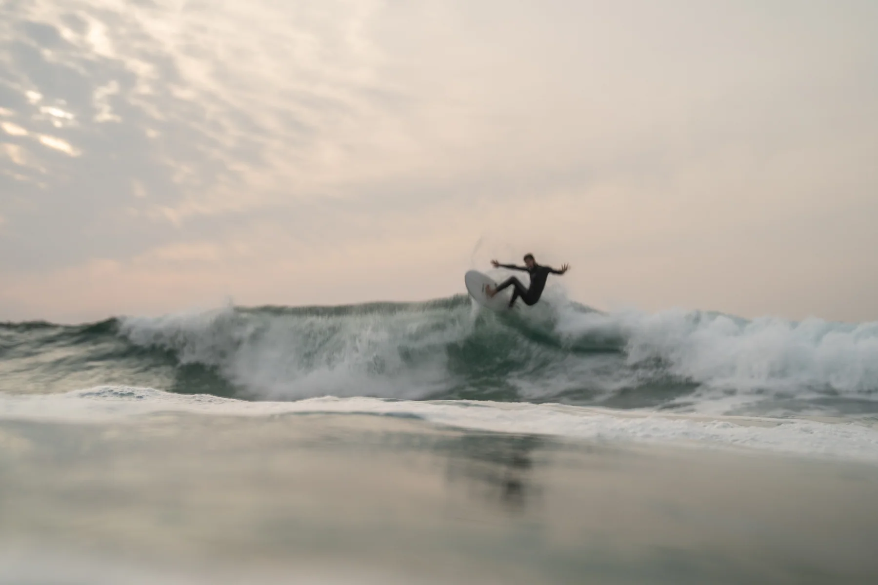 Freddy surfing a Yugen Buri on a breaking wave
